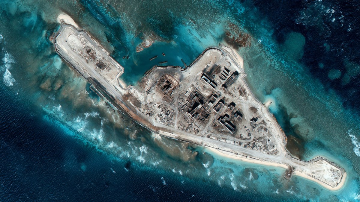 By pouring millions of tons of concrete into shallow waters year after year, China turned disputed reefs into permanent military outposts